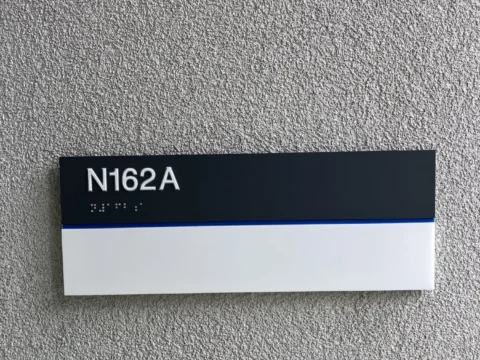 Room N162A identification sign installed outside a doorway