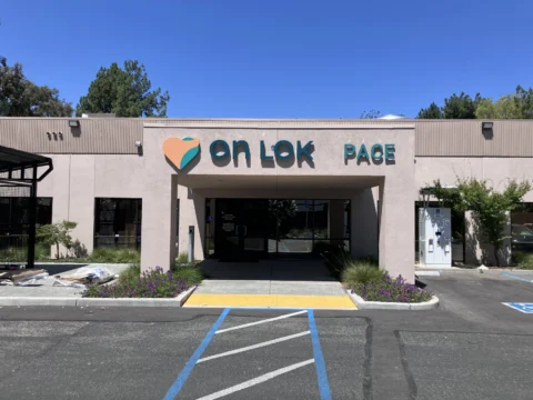 On Lok PACE dimensional lettering above an accessible entrance