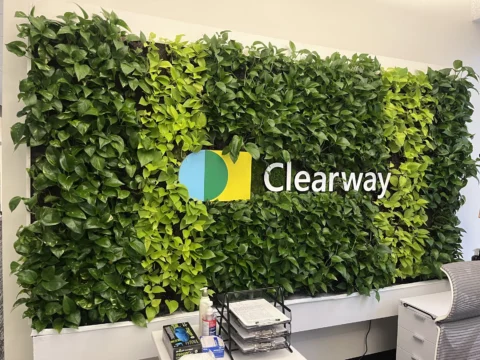 Clearway dimensional logo installed on an interior living wall