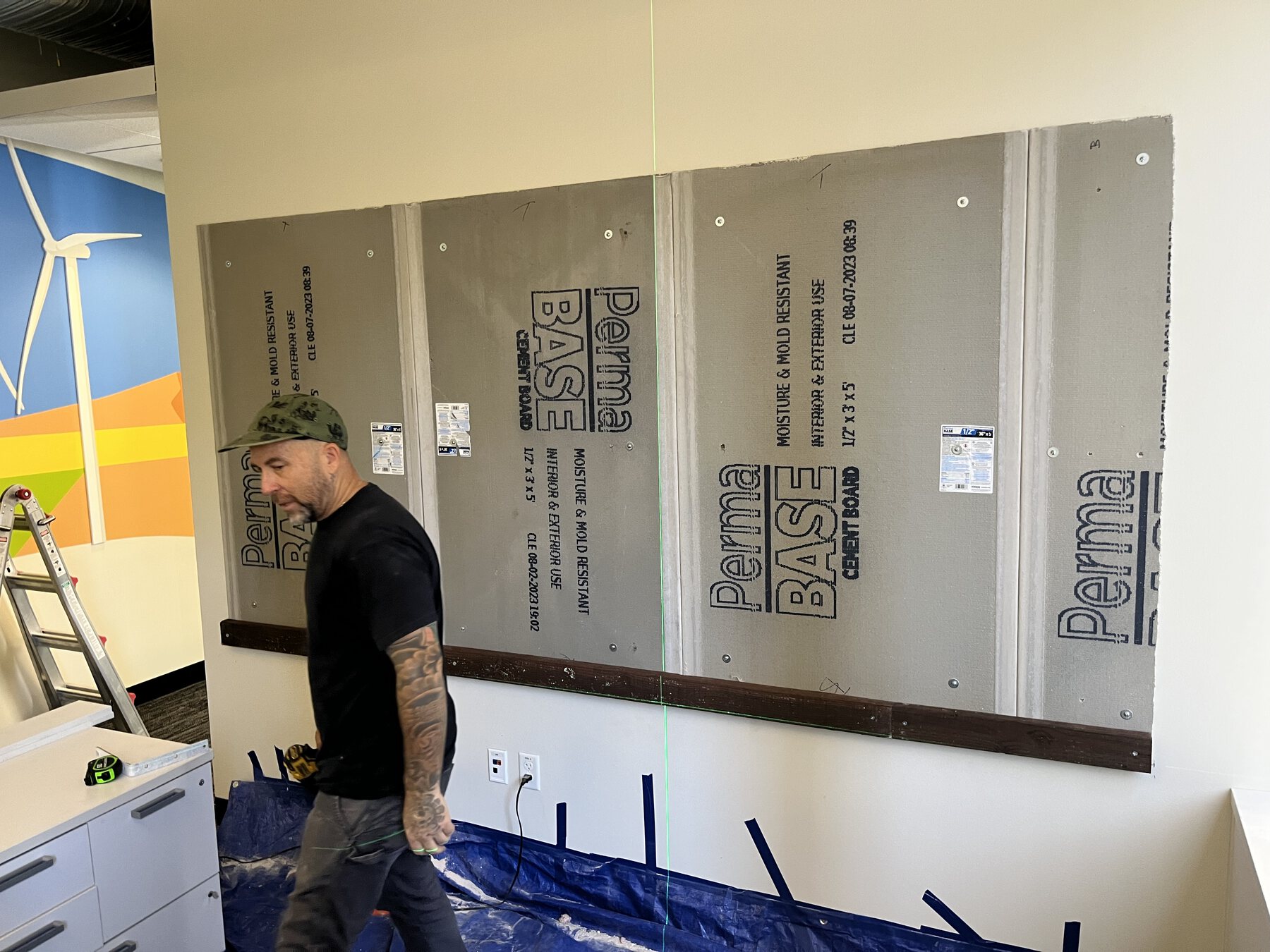 Recognition wall panels aligned during installation