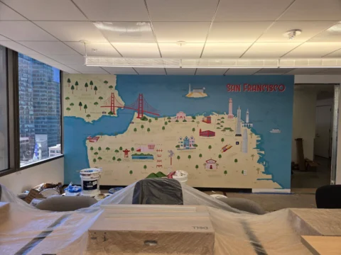 San Francisco illustrated map mural installed in a conference room